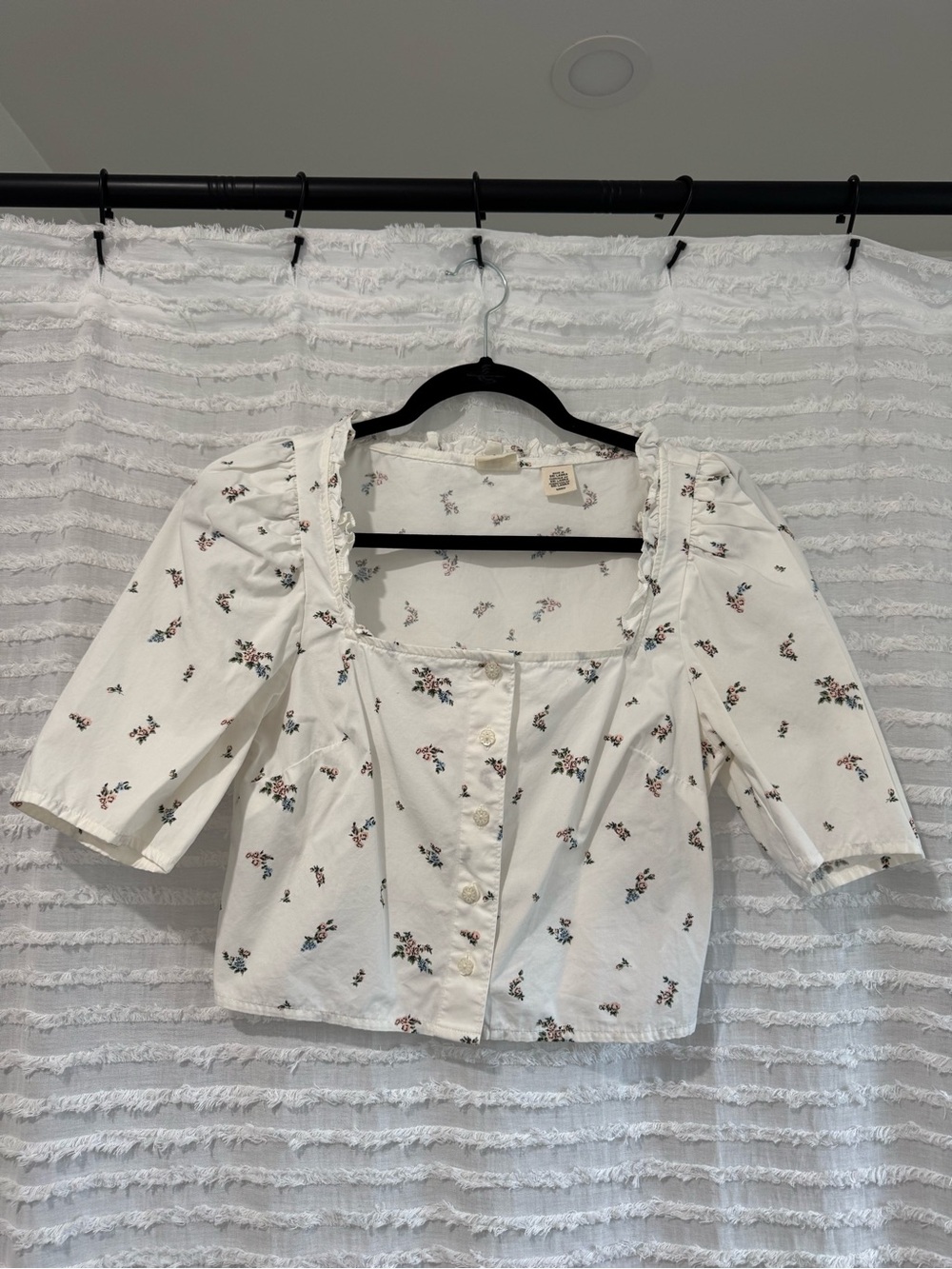 Levi's White Top with Pale Pink Floral Accents